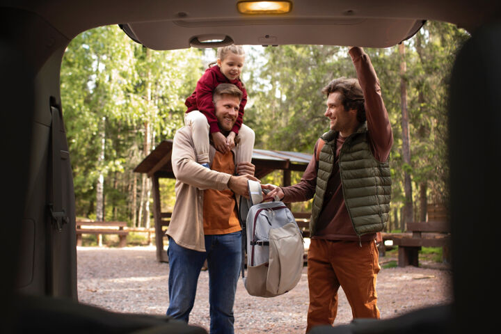 girl-with-her-dads-enjoying-family-trip