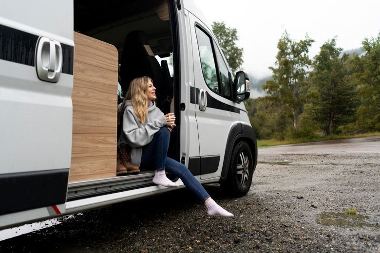 woman-relaxing-her-camper-daylight (1)